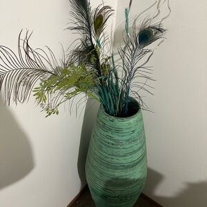 Elegant Green Striped Vase with Peacock Feathers